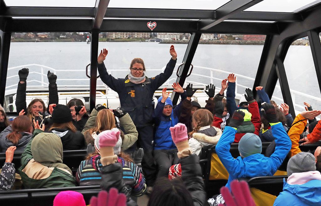 Guest contributions help fund our award-winning education program, seen in action here as kids return from a tour experience on the Salish Sea.